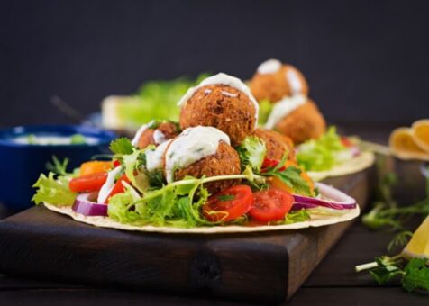 tortilla-wrap-with-falafel-fresh-salad-vegan-tacos-vegetarian-healthy-food_2829-6193